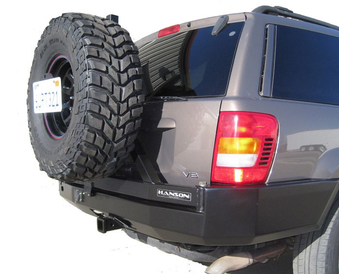 Rear bumper tire carrier jeep grand cherokee